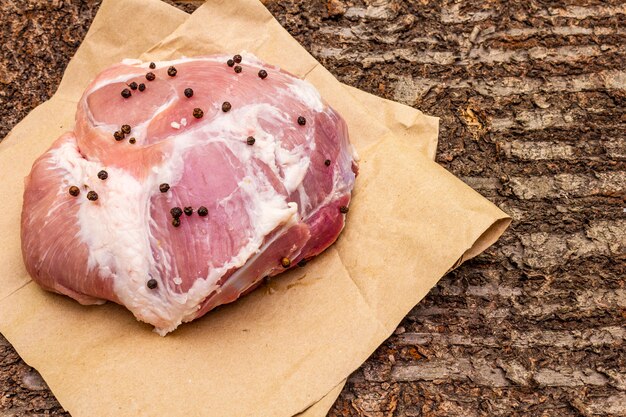 Raw pork shoulder with spices