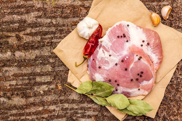 Raw pork shoulder with spices