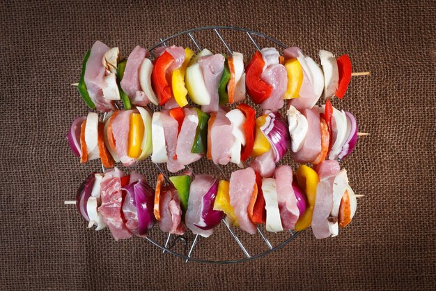 Raw pork skewers ready for grilling