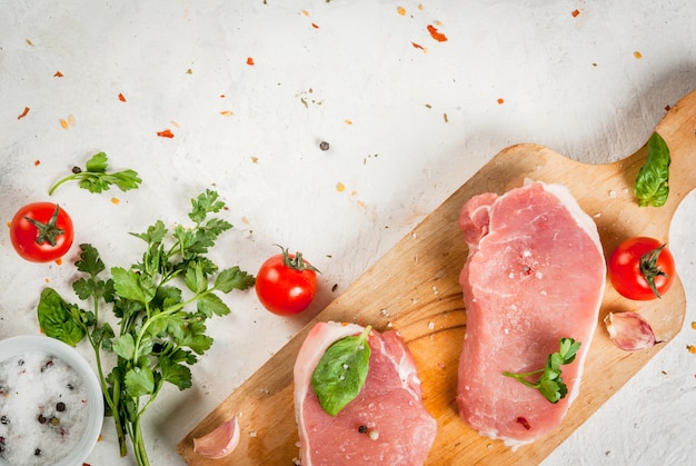 Raw pork, steak, cutlet.