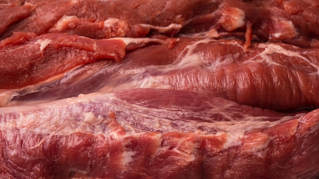 Raw pork tenderloin isolated on a white background