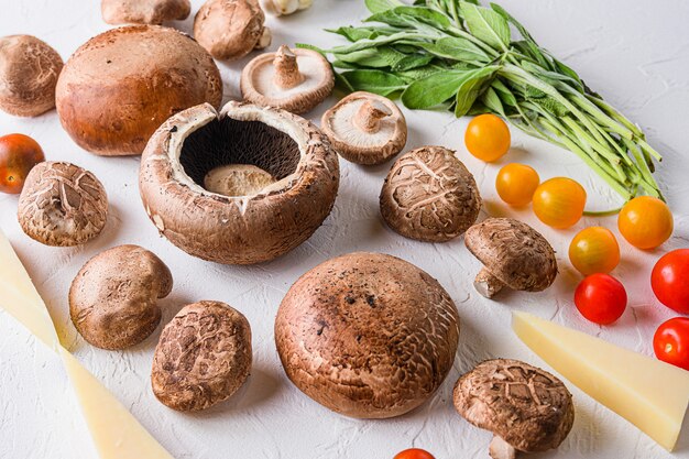 Raw portobello and shiitake mushrooms with herbs