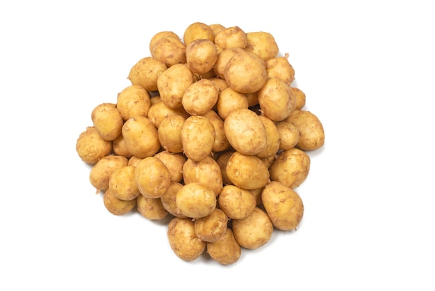 Raw potato isolated on a white surface. Top view.