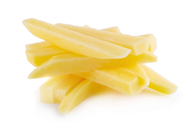 Raw Potato sliced strips prepared for French fries isolated over white background.