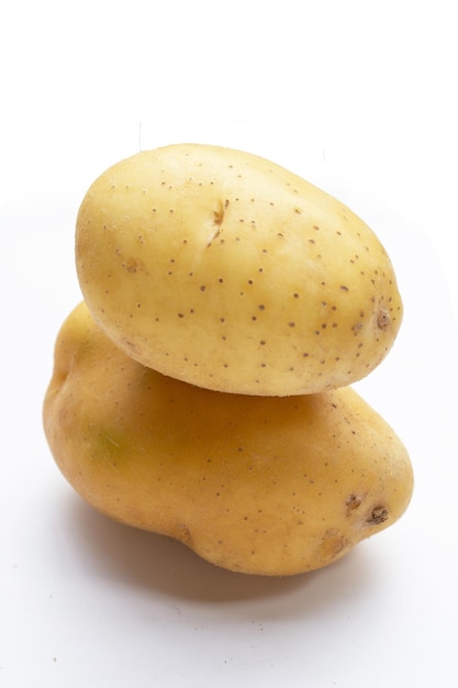 Raw potatoes isolated on white background