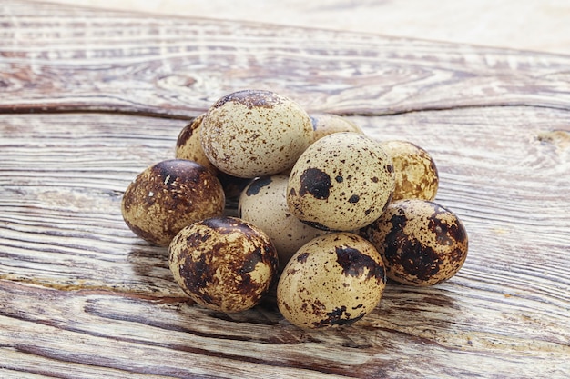 Raw quail eggs heap in the bowl