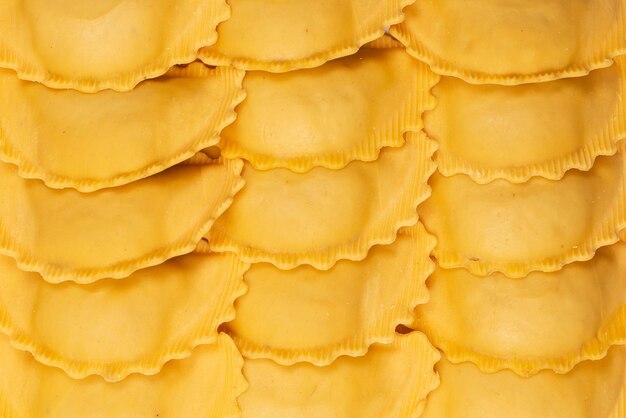 Raw ravioli as a background healthy italian food