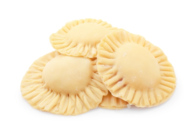 Raw ravioli on white background