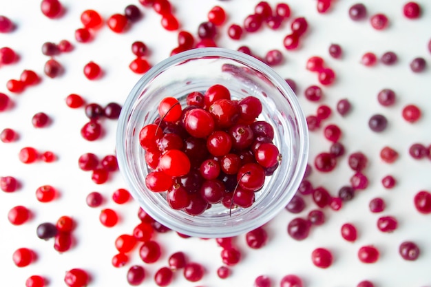 Raw red cranberries in a glass