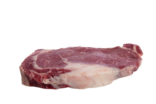 Raw ribeye steak. A piece of marbled beef. Isolated on white background.
