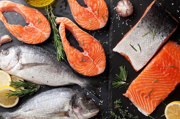 raw salmon and dorado fish fillet
