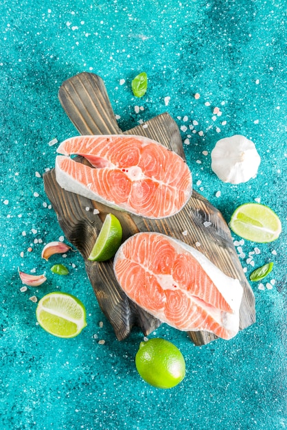 Raw salmon fish steaks with spices