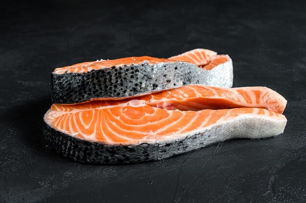 Raw salmon steak on a table