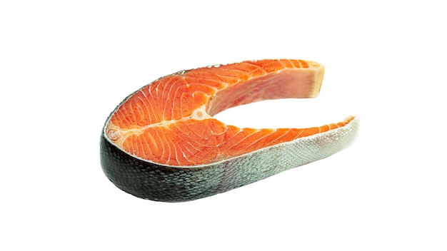 Raw salmon steak on a white background