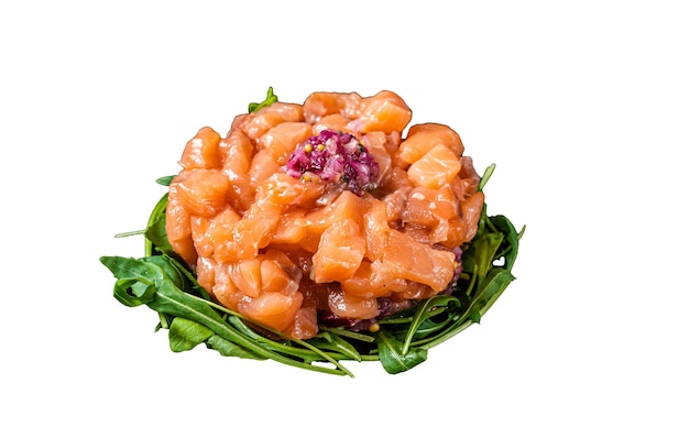 Raw Salmon tartare or tartar with red onion arugula and capers in black plate Isolated on white background