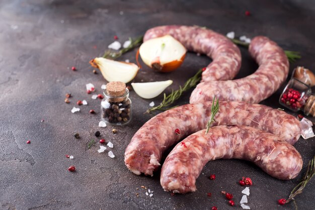 Raw sausages with spice