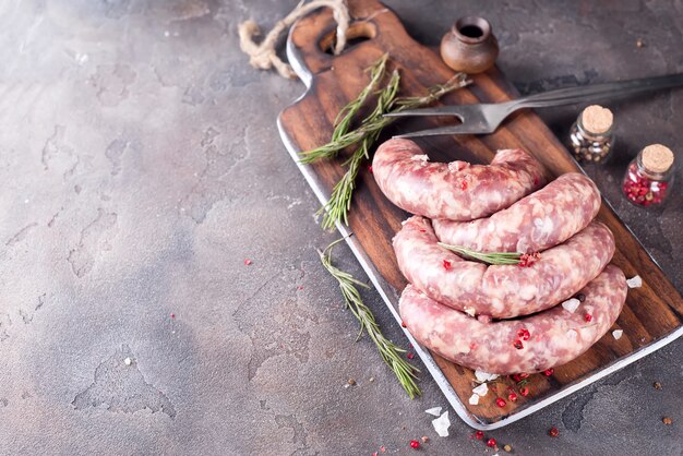 Raw sausages with spice