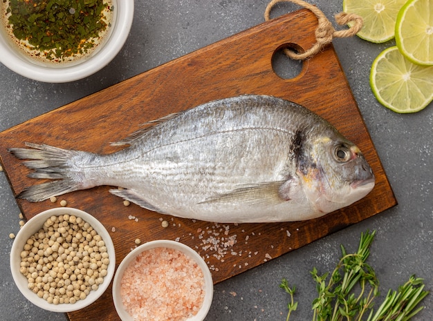 Raw Sea bream with lime, pepper and salt