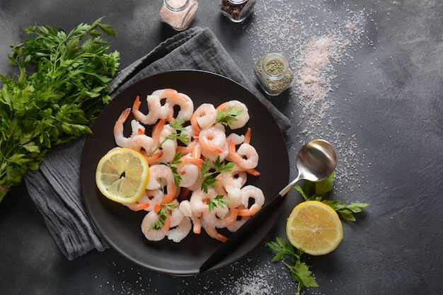 Raw shrimps and prawns in a plate