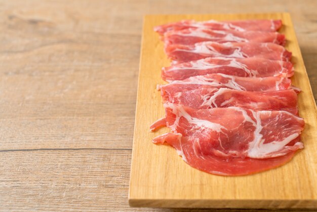 Raw sliced pork collar