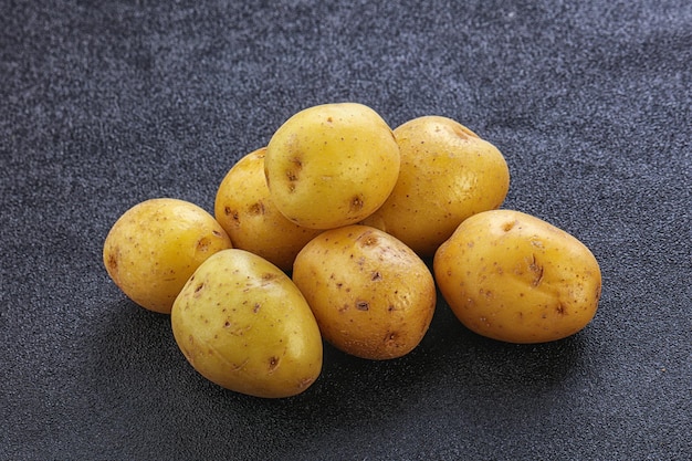 Raw small organic baby potato for cooking