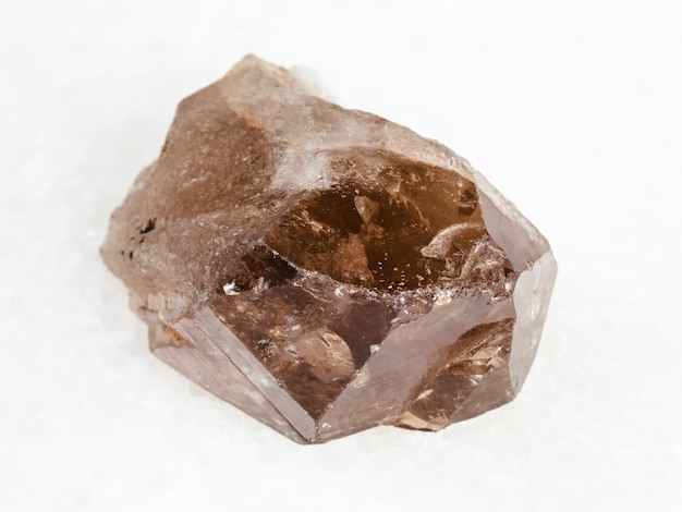 Raw smoky quartz crystal on white