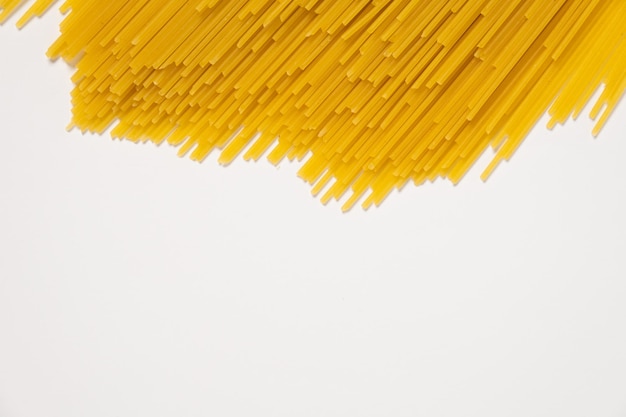 Raw spaghetti italian food macro on white background