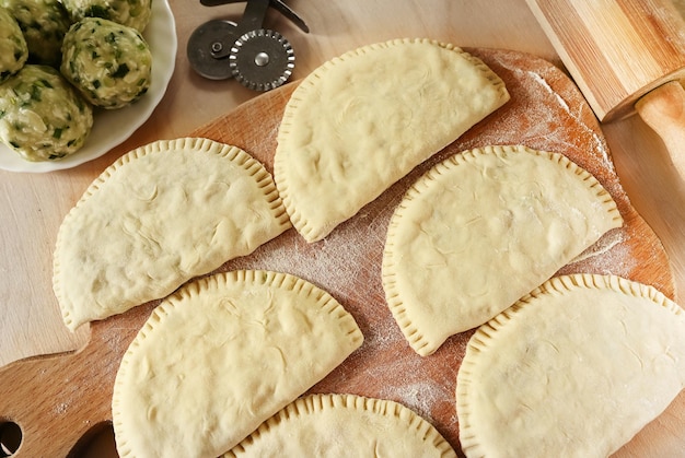 Raw spanish empanadas on the table