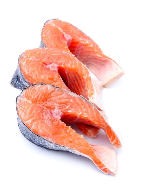 Raw steak salmon fish. Red fish closeup on white