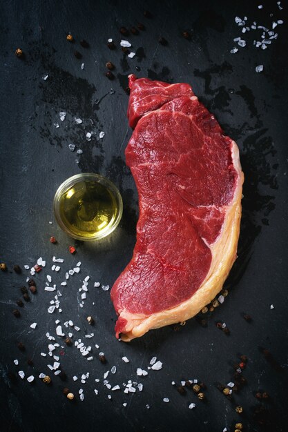 Raw steak with olive oil