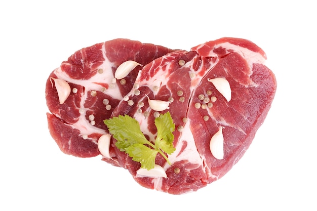 Raw steaks of pork neck seasoned with pepper and garlicxD