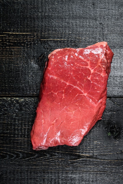 Raw strip loin steak. Beef meat. Top view