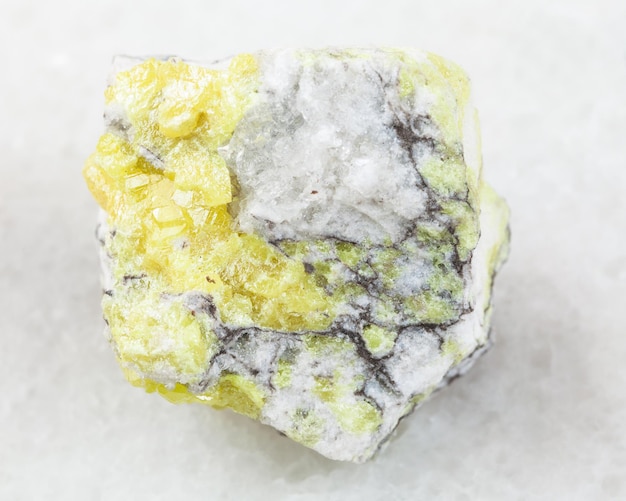 Photo raw sulfur ore on white