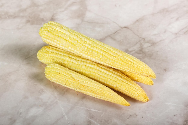 Raw sweet baby corn heap