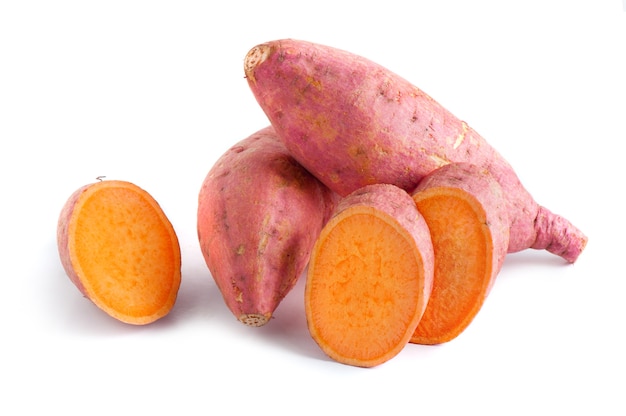 Raw sweet potatoes isolated on white