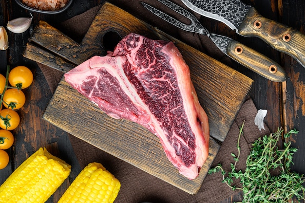 Raw Tbone Steak for grill or BBQ with ingredients set