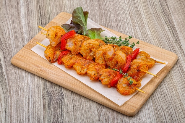 Raw tiger shrimps skewer