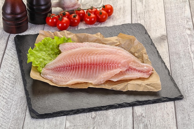 Raw tilapia fish