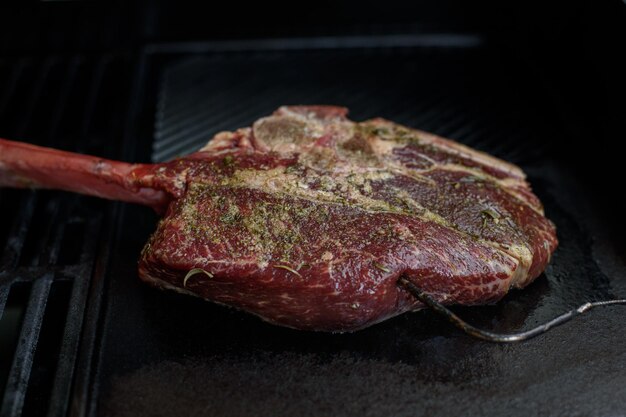 Raw Tomahawk steak