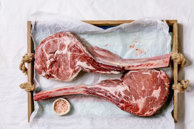 Raw tomahawk steak