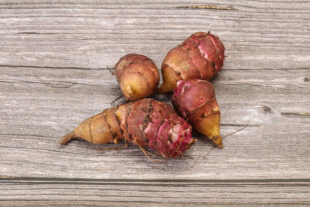 Raw topinambur root or Jerusalem artichoke