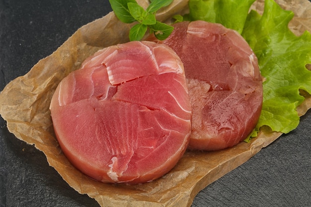 Raw tuna round steak for grill