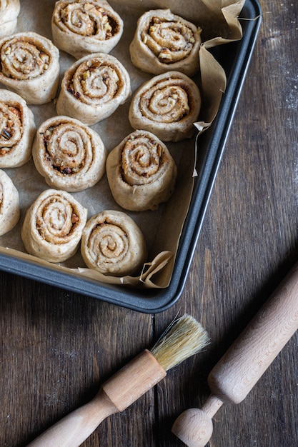 Raw uncooked cinnamon roll buns