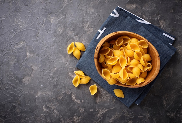 Raw uncooked italian conchiglioni  pasta