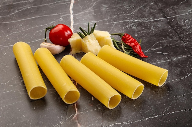 Raw uncooked Italian pasta Cannelloni