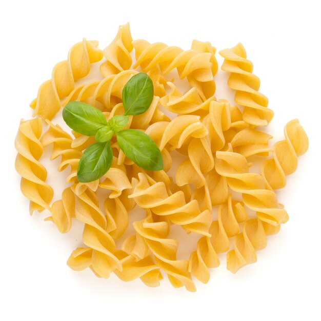 Raw uncooked pasta penne isolated