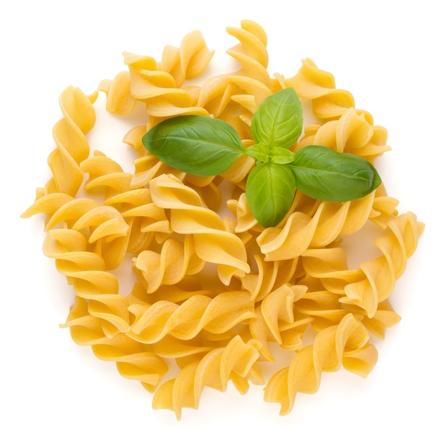 Raw uncooked pasta penne on the white background.