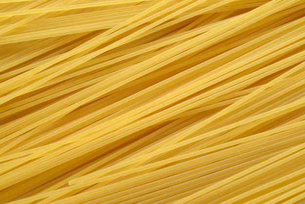 Raw uncooked spaghetti pasta background