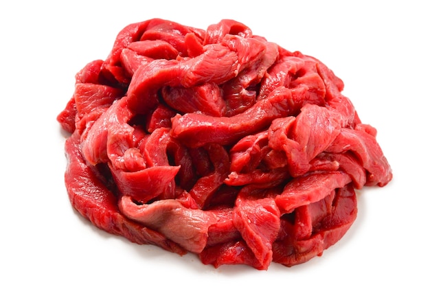 Raw veal pieces background.  Beef stroganoff.