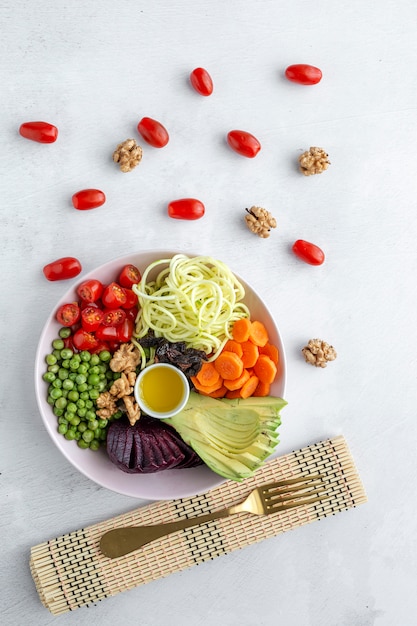 Raw vegan salad with assorted vegetables